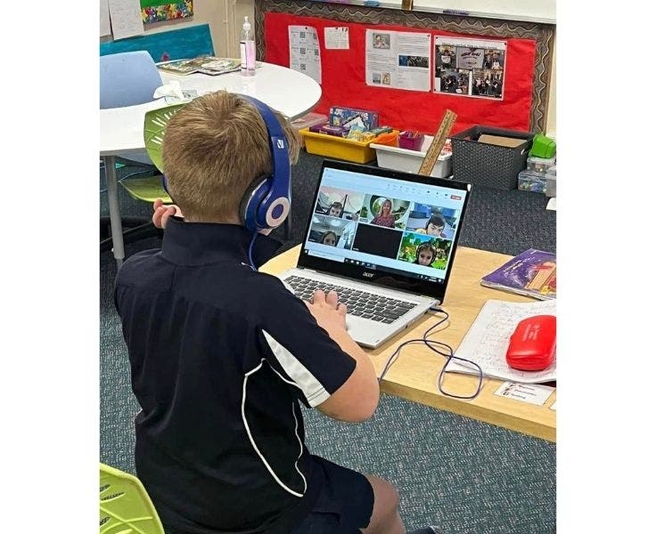A student on a laptop learning.